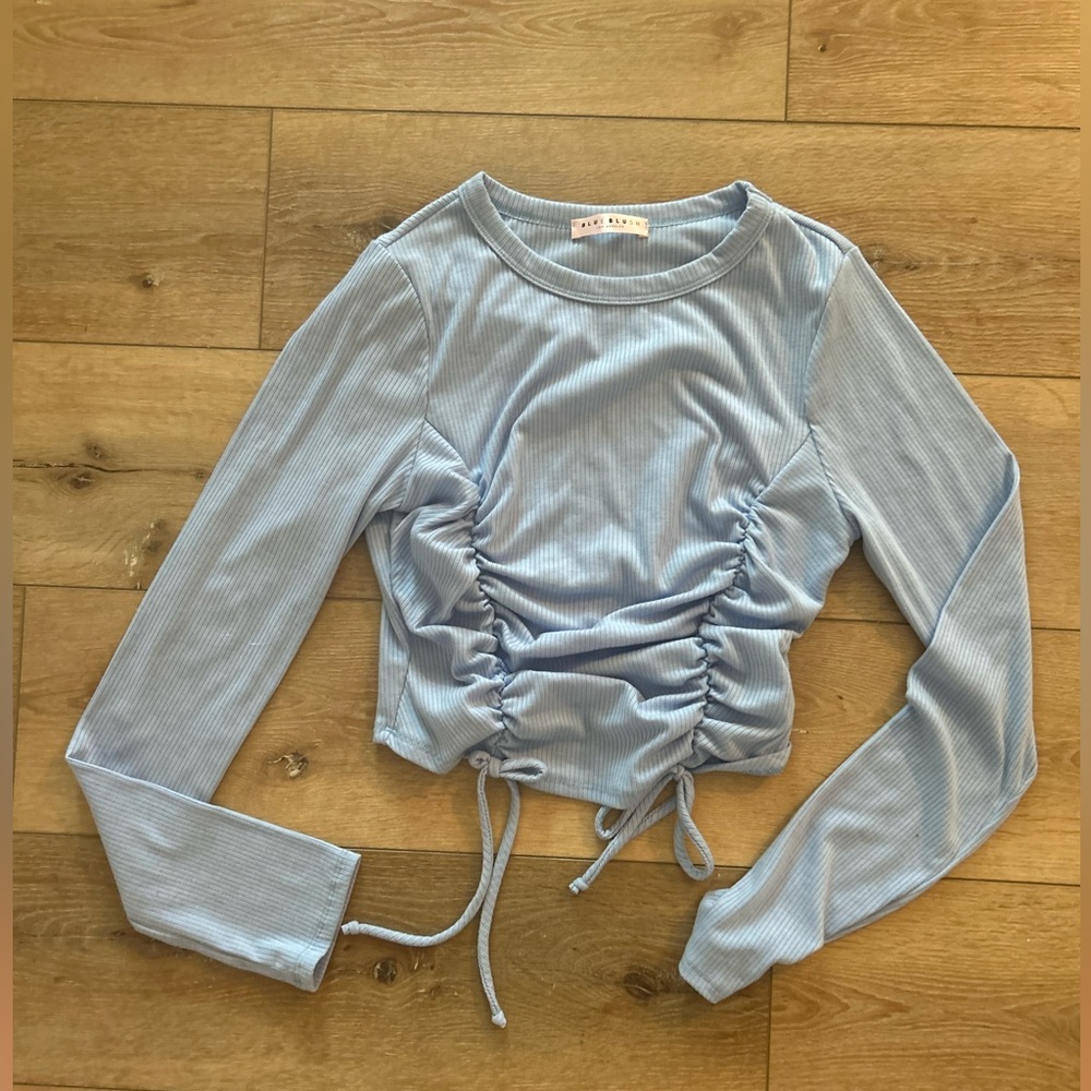 Light blue cropped long sleeve top